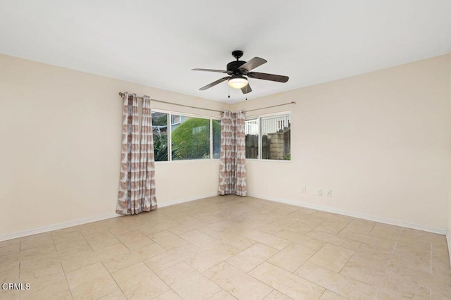 empty room featuring ceiling fan