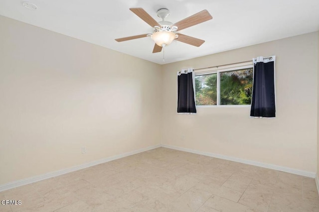 unfurnished room featuring ceiling fan