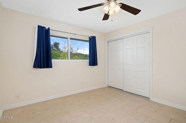 unfurnished bedroom with a closet and ceiling fan