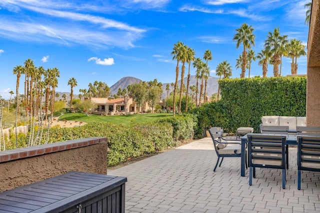 view of patio featuring a mountain view