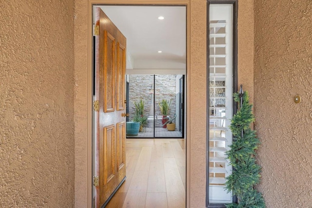 interior space with hardwood / wood-style floors