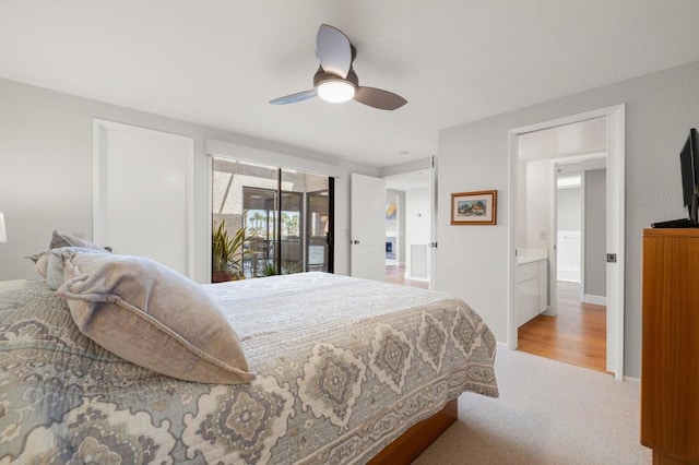 bedroom with light carpet and ceiling fan