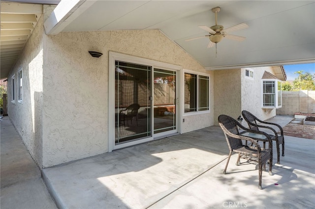 view of patio with ceiling fan