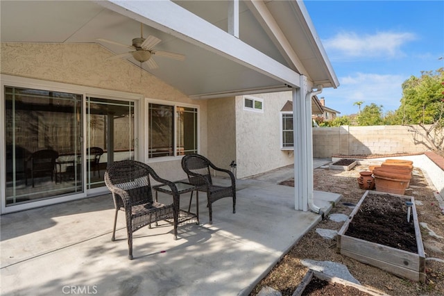 view of patio with ceiling fan