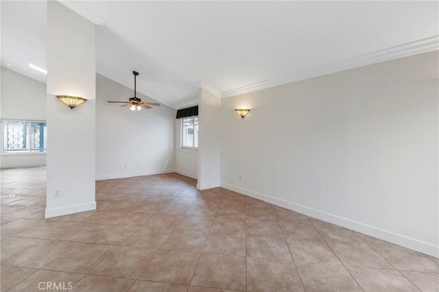 tiled spare room featuring crown molding, ceiling fan, and vaulted ceiling