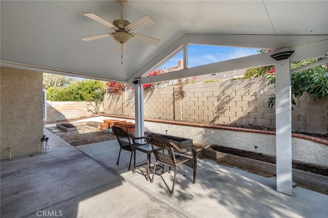 view of patio / terrace featuring ceiling fan