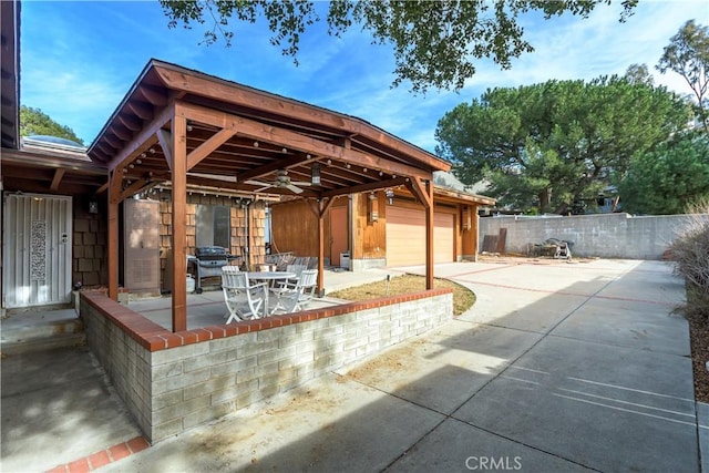 view of patio / terrace with a garage