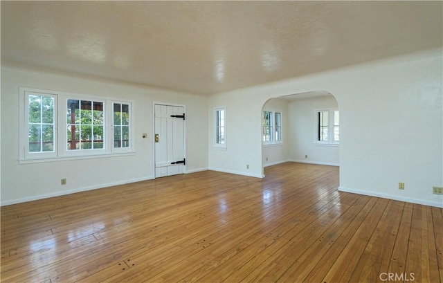 unfurnished living room featuring light hardwood / wood-style flooring