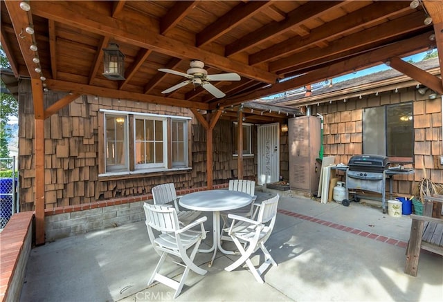 view of patio featuring ceiling fan and area for grilling