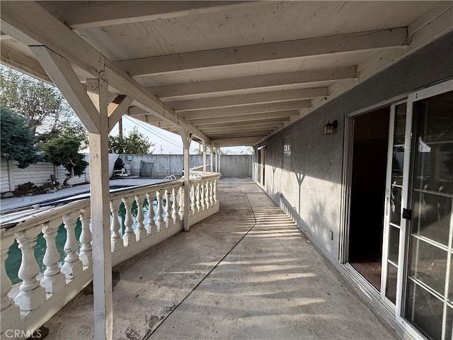 view of patio / terrace with an empty pool