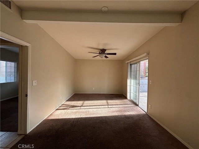 unfurnished room with lofted ceiling with beams, carpet, and ceiling fan