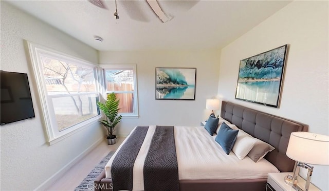 bedroom featuring ceiling fan