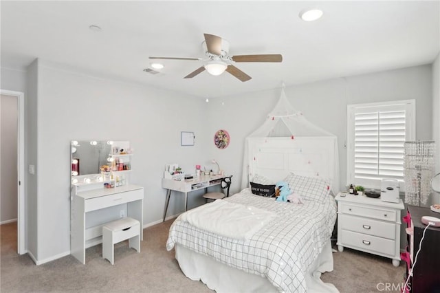 carpeted bedroom with ceiling fan