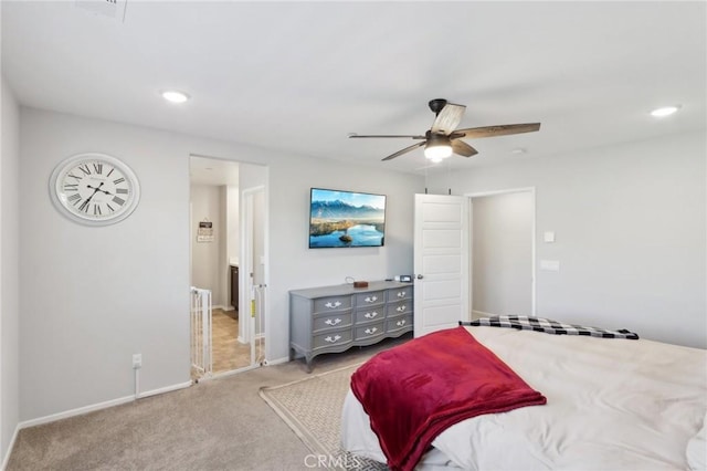 carpeted bedroom featuring ceiling fan