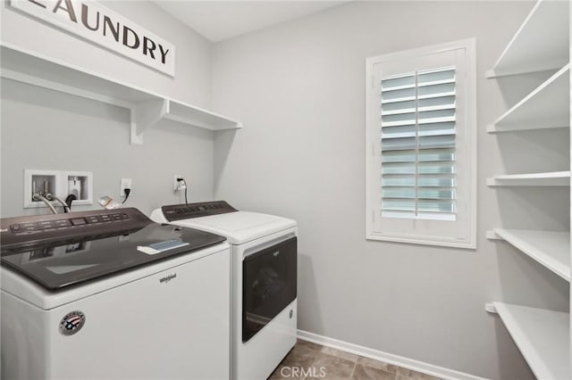 laundry area with washer and clothes dryer