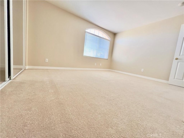 spare room with light colored carpet