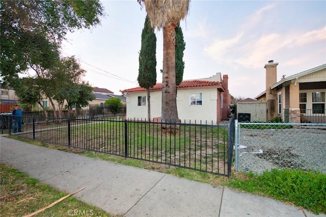 view of front of home with a front lawn