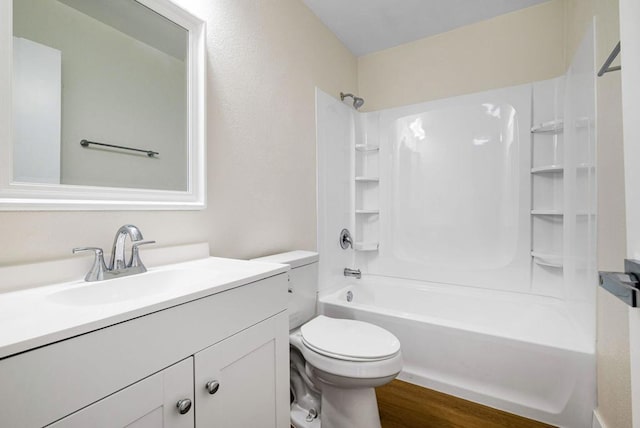 full bathroom featuring shower / bathtub combination, vanity, toilet, and hardwood / wood-style floors