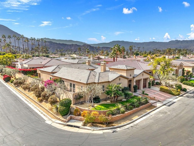 drone / aerial view featuring a mountain view