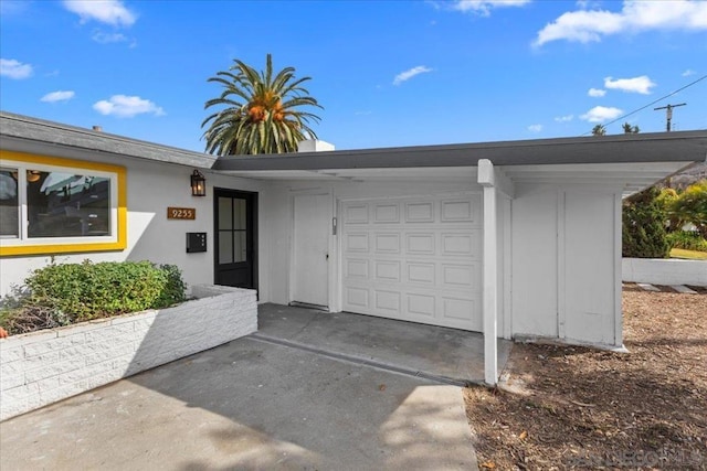 exterior space with a carport