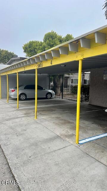 view of car parking with a carport