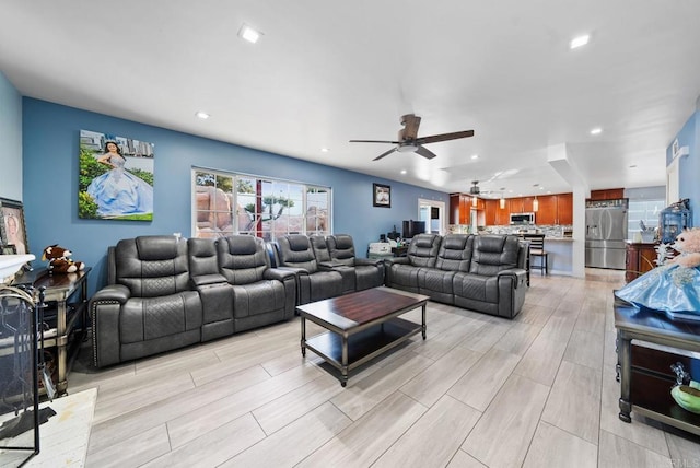 living room with ceiling fan