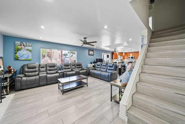 living room with ceiling fan