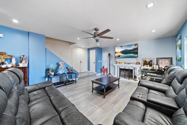 living room featuring ceiling fan