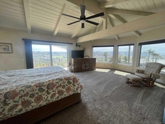 carpeted bedroom with vaulted ceiling with beams, ceiling fan, multiple windows, and access to outside