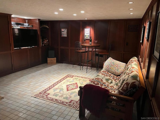 living room with light tile patterned floors