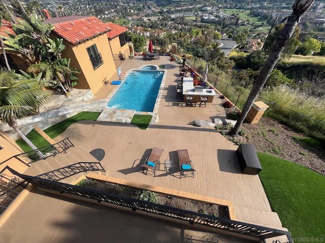 view of pool featuring a patio