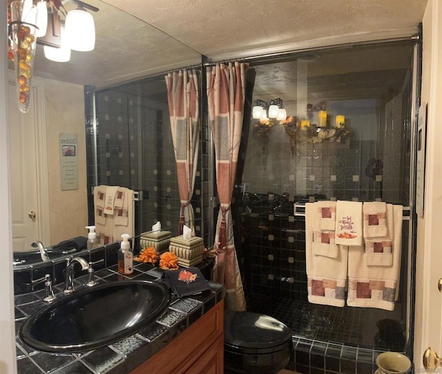 bathroom featuring vanity, toilet, and a shower with curtain