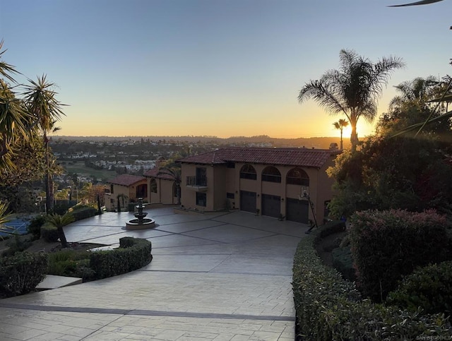 view of front of property with a garage