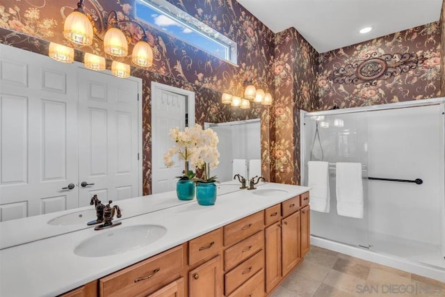 bathroom with vanity and an enclosed shower