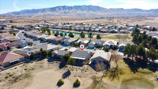 bird's eye view with a mountain view