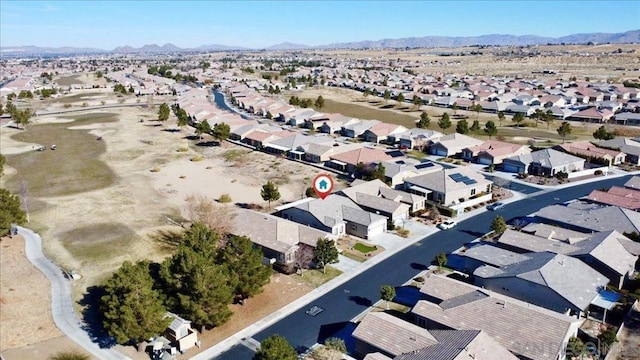 bird's eye view with a mountain view