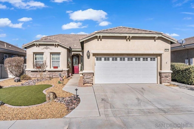 view of front of property with a garage