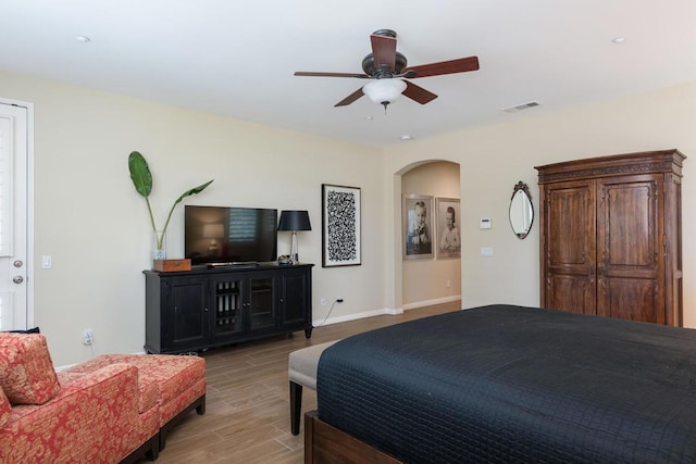 bedroom featuring ceiling fan and light wood-type flooring