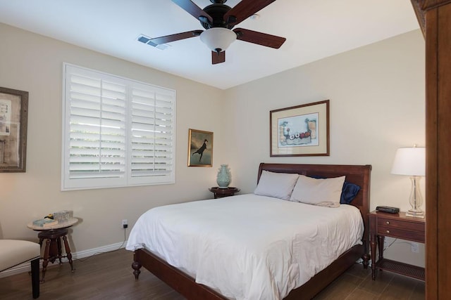 bedroom featuring dark wood-type flooring and ceiling fan