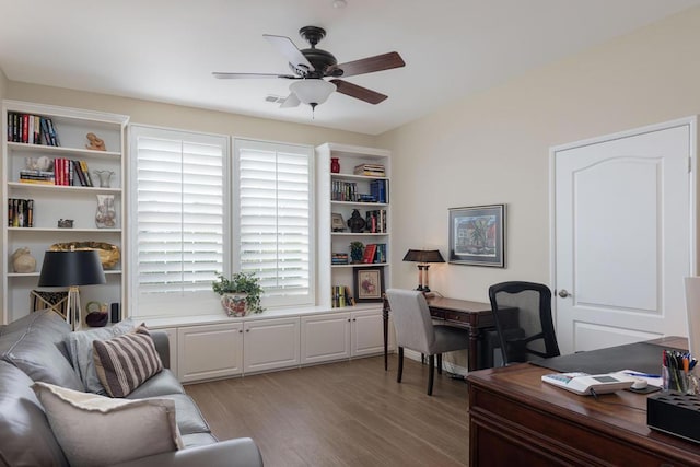 home office with ceiling fan and light wood-type flooring