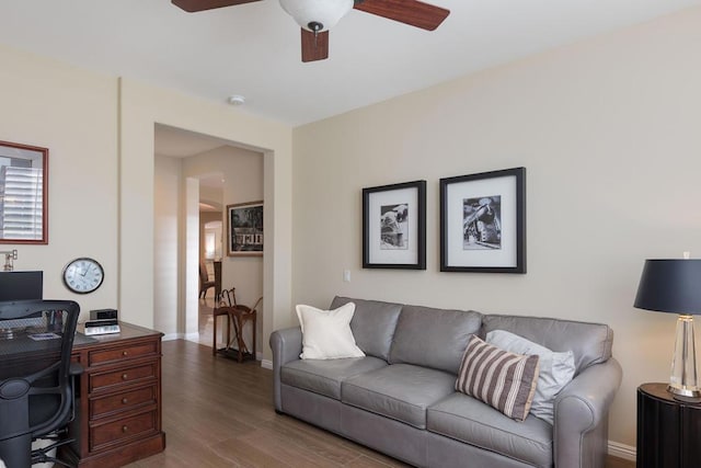 office space featuring dark hardwood / wood-style floors and ceiling fan