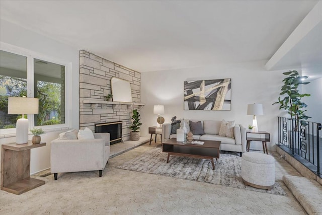 living room featuring a fireplace