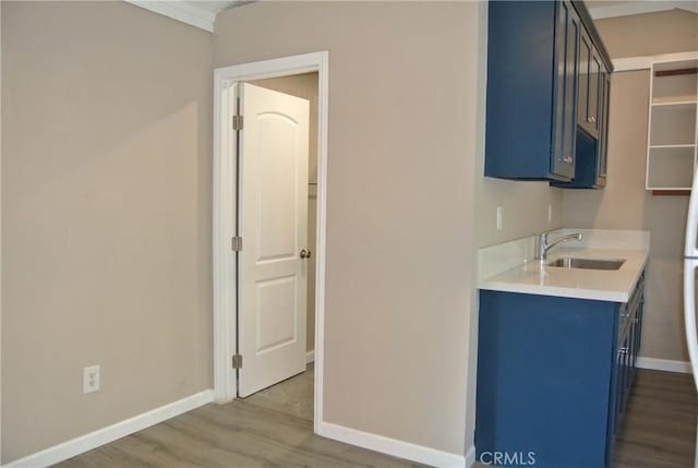 bathroom featuring sink and hardwood / wood-style flooring