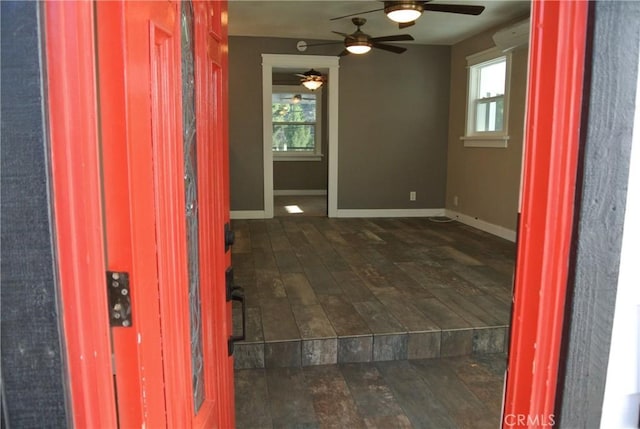 spare room featuring dark wood-type flooring