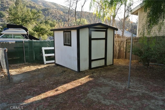 view of outdoor structure featuring a mountain view