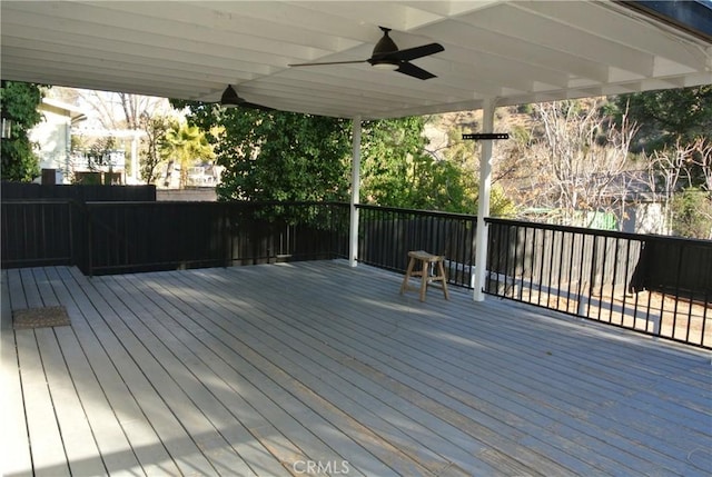 wooden terrace with ceiling fan