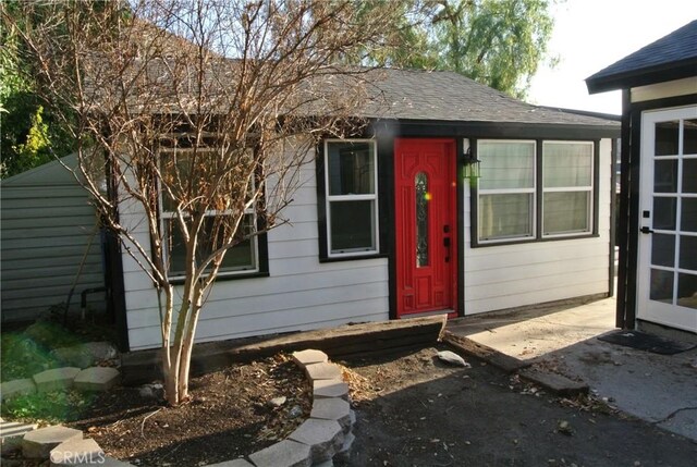 doorway to property featuring a patio