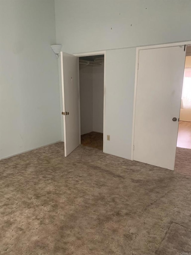 unfurnished bedroom with carpet flooring