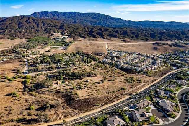 drone / aerial view featuring a mountain view