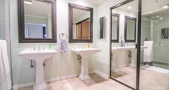 bathroom with tile patterned flooring, ornamental molding, and walk in shower